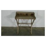 Desk, legs fold, center drawer is missing