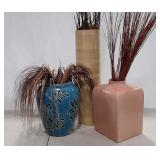 Three large vases, bamboo and ceramic