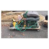 Skid lot: gardening items, hoses, sprinkler,