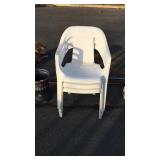 Three poly stacking chairs