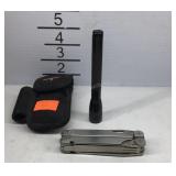 Leatherman wave multi-tool with mini mag light