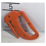 Sure-Lok web cutter, for cutting sell belts or