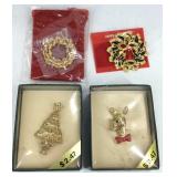 Four Christmas brooches