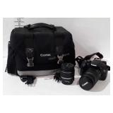 Canon EOS Rebel T2i camera with two lenses and