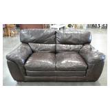 Leather love seat, 70", tear as shown