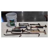 Five gallon bucket with tools, hammers, crowbars,