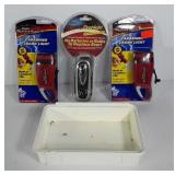 Container with three wind-up flashlights, all