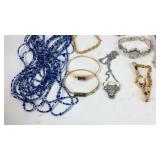 Avon marked jewelry and watches