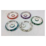 Five costume bracelets with matching rings