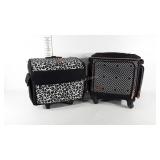 Two crafters storage bags on wheels, one We R