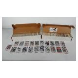 Two boxes of NFL football collector