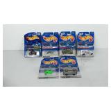 Six hotwheels cars in original packaging,
