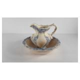 Blue trimmed pitcher and wash basin, few