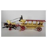 Large cast iron horse drawn fire wagon with