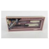 Portable battery operated curling iron, new in