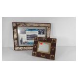 Two cabin style frames, smaller is a Thomas