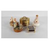 Four music boxes and a large brass Cricket box