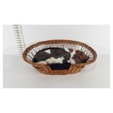 Plaster hound dog statue with wicker bed