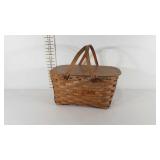 Picnic basket with hinged lid and double handles