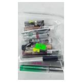 Makeup, includes mascara, lipstick, and lip gloss