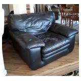 Black pleather Living Room Chair. Needs cleaned