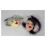 Hobbyist ceramic wall faces, two