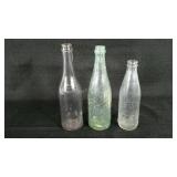 Three glass advertising bottles, Robert Porter