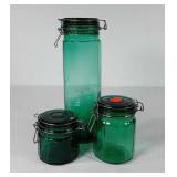 Three glass canisters