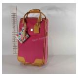 Diane Von Furstenberg pink luggage on wheels,