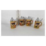 Four beer steins with lids, 8" tall