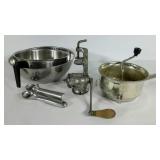 Two bowls, two scoops, a grinder and a food mill