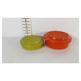 Two Tupperware bowls with lids