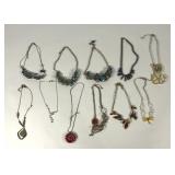Eleven costume jewelry necklaces