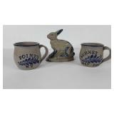 Blue and gray pottery, rabbit and two WV mugs