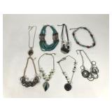 Eight costume jewelry necklaces