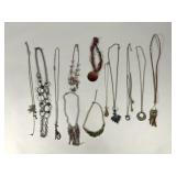 Dozen costume jewelry necklaces