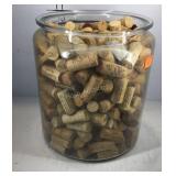 Glass jar filled with wine bottle corks