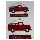 Two red truck metal Welcome signs, new with tags