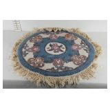 29" round floral scatter rug with fringed edge