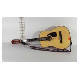 T.A. Lawrence acoustic guitar with strap, model