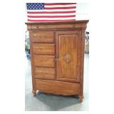 High chest, 6 drawers, 1 door, pegs present but