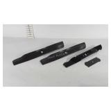 Three lawn mower blades and edger blade
