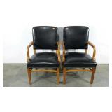 Two leather look arm chairs, seller code BX