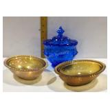 Three pieces of colored glass, two amber bottoms