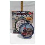 Two train themed clocks, Lionel 100th anniversary