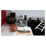 Tote full of decor, floor mats, plane, copper