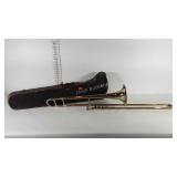 F.E. Olds and Son trombone with case, some