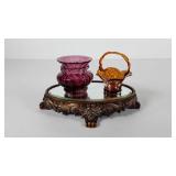 Two small blown glass vases with mirrored display