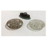 Three flower frogs. One is metal