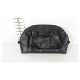 Black leather Coach purse, not authenticated by
